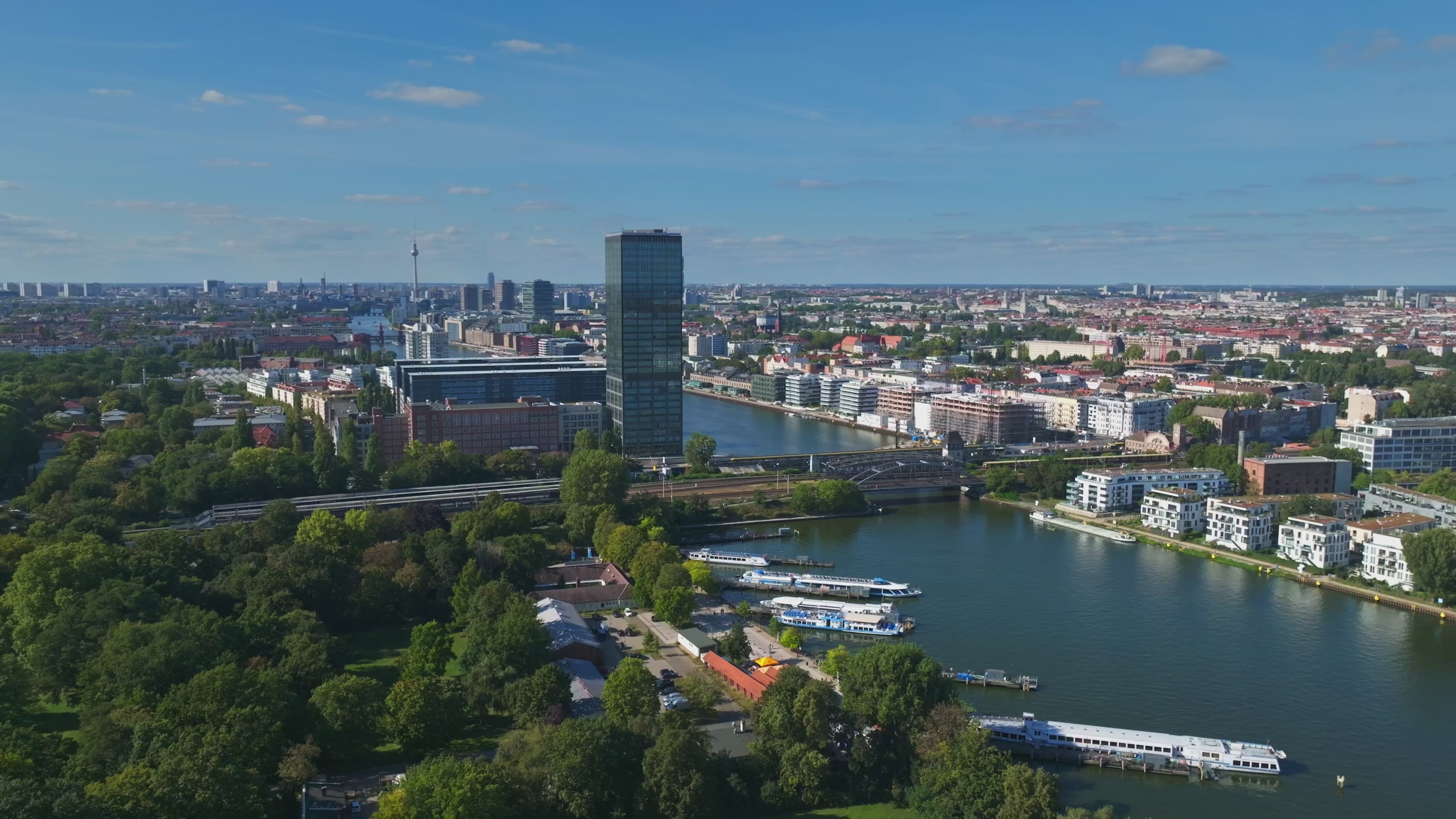 Aerial view of the Spree River with Molecule Man sculpture in Berlin, Germany.