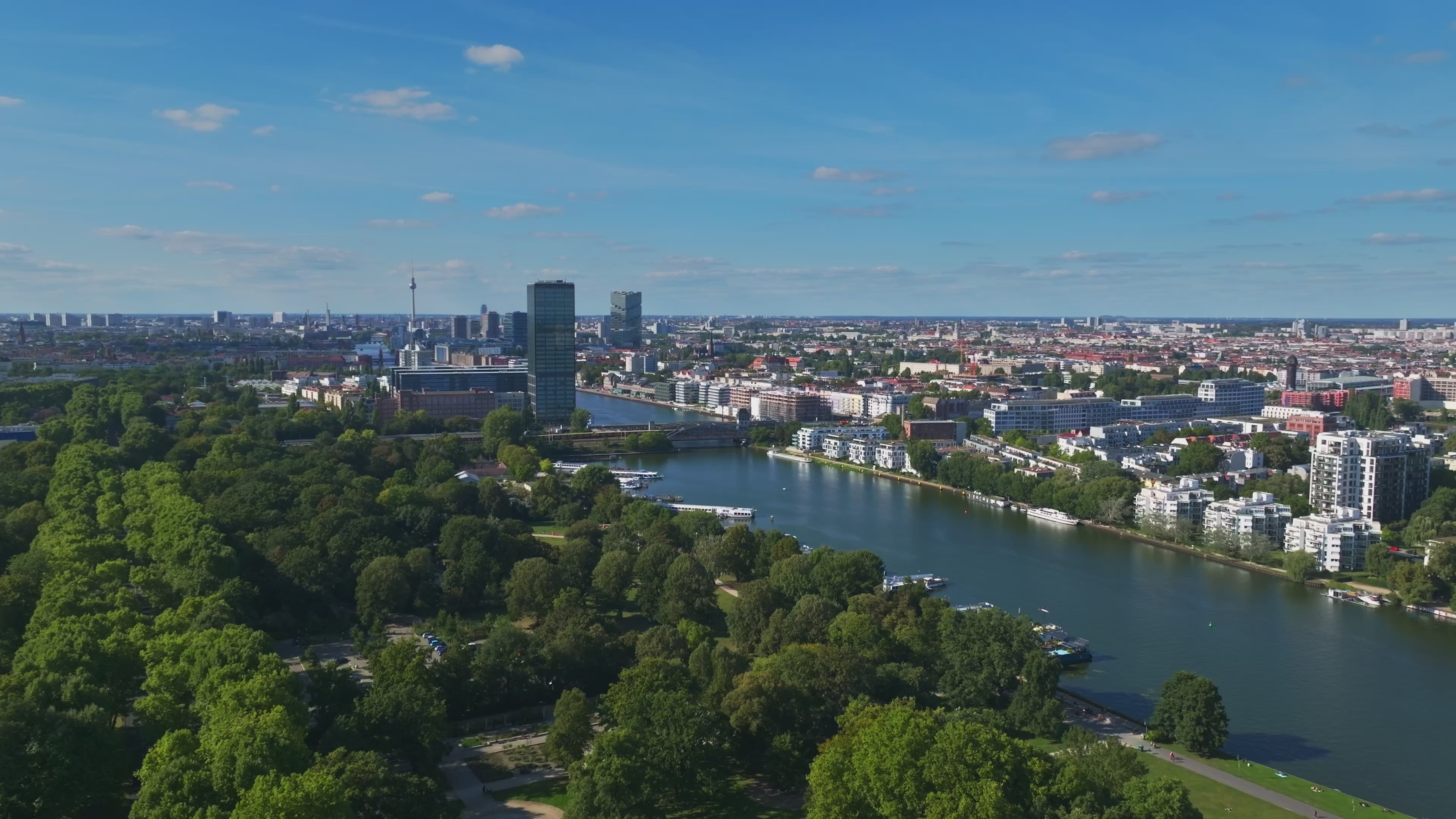 Aerial view of the Spree River with Molecule Man sculpture in Berlin, Germany.