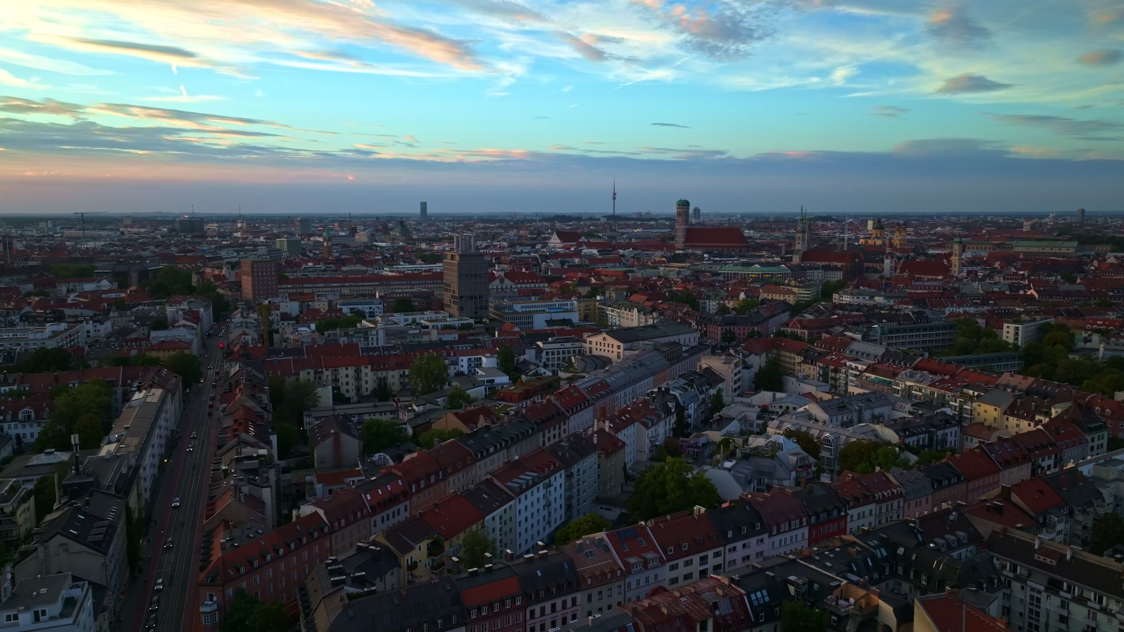 Aerial drone view of Munich, Germany at sunset .